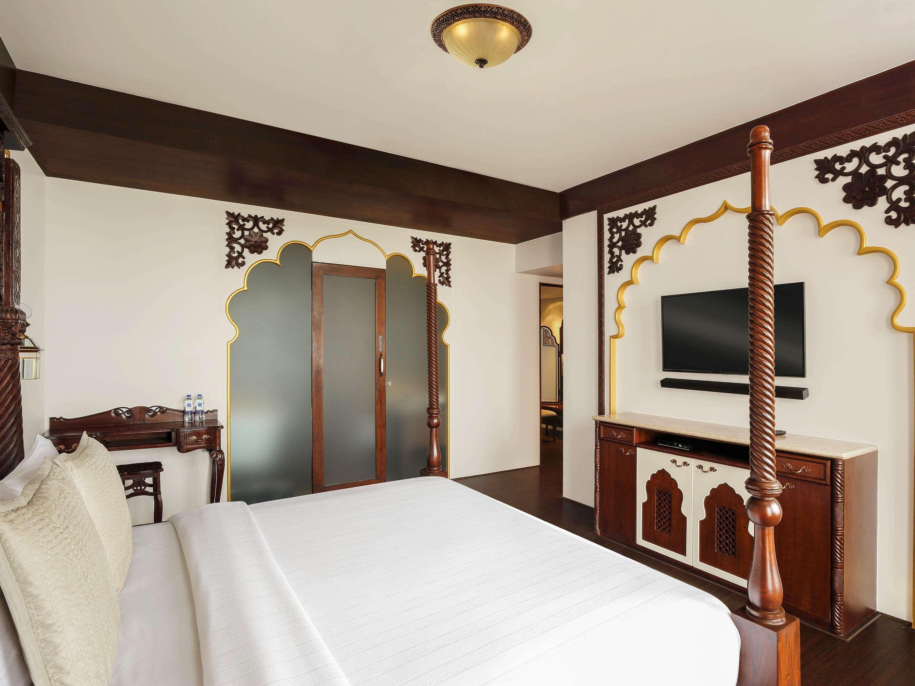 孟买珠瑚海滩诺富特酒店 外观 照片 A bedroom at the Taj Mahal Palace